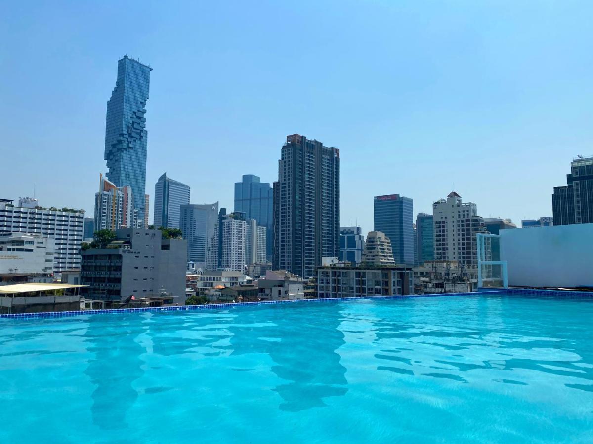 Sapphire Hotel Silom Бангкок Экстерьер фото View of the city from the rooftop pool