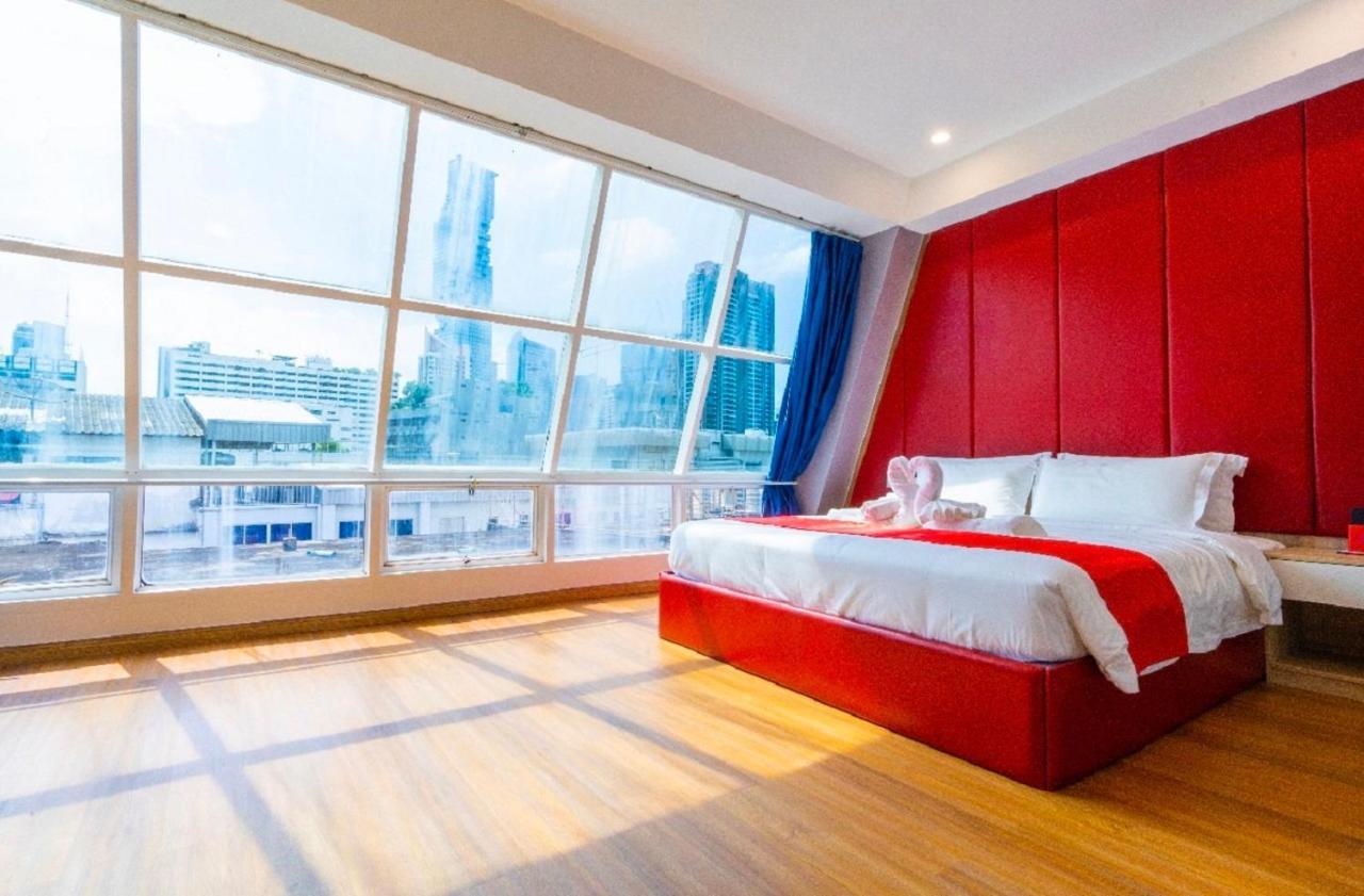 Sapphire Hotel Silom Бангкок Экстерьер фото A bedroom at the hotel