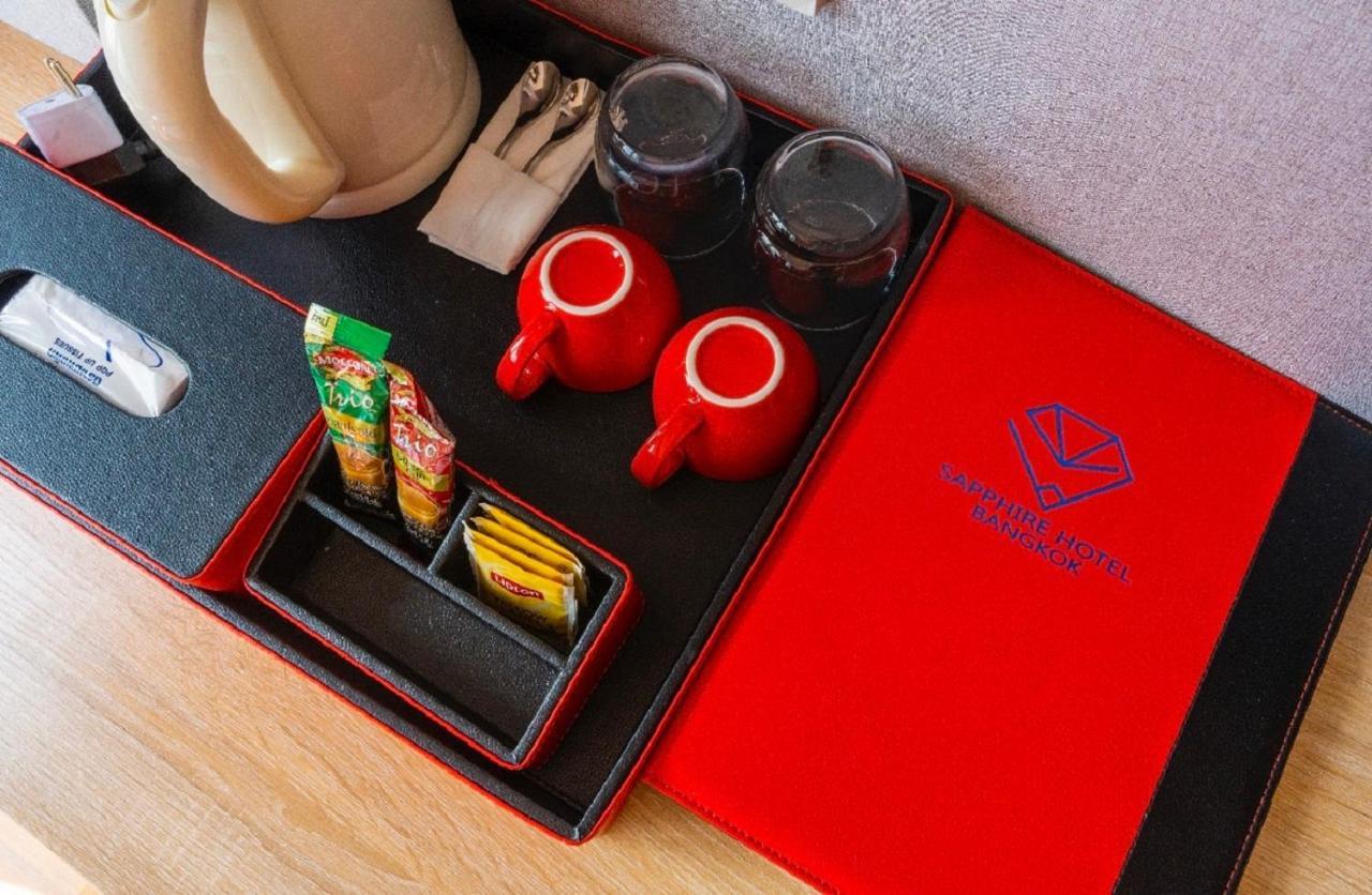 Sapphire Hotel Silom Бангкок Экстерьер фото A tea tray